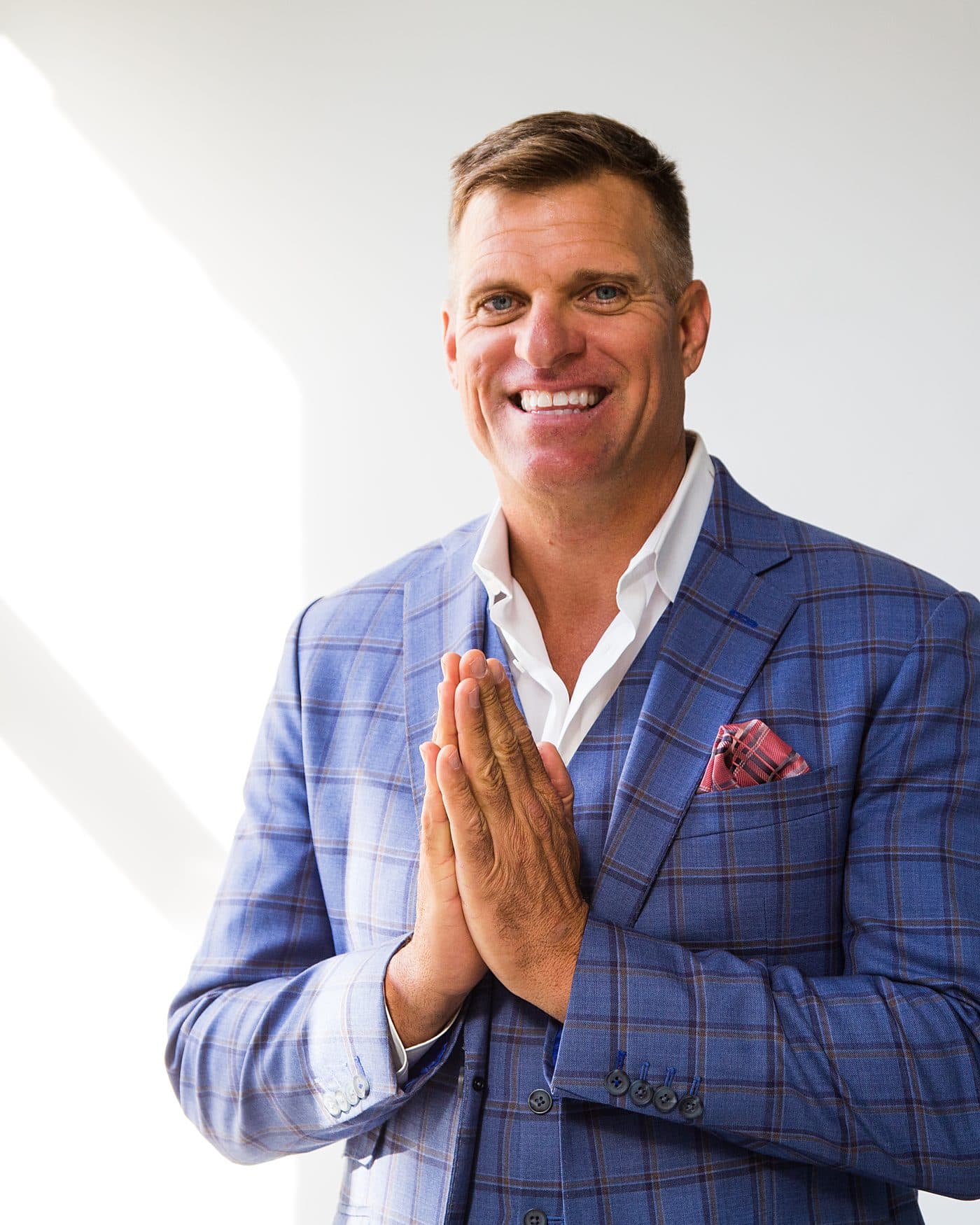 Dave VanHoose with his hands pressed together in gratitude