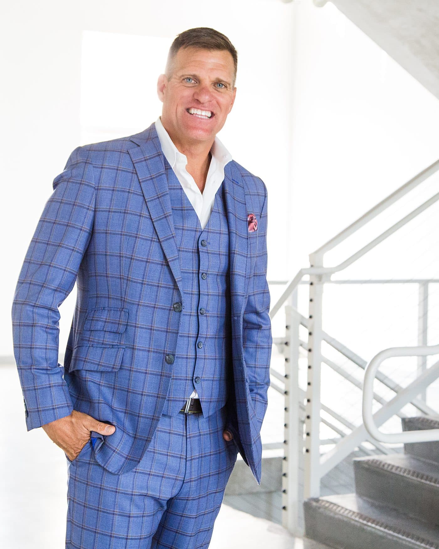 Dave VanHoose in a stairwell, three-piece suit